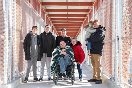 South Jordan Man in Wheelchair Celebrates as First to Cross UDOT's New Pedestrian Bridge