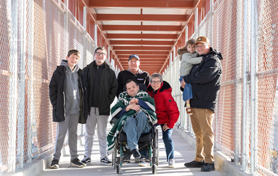 South Jordan Man in Wheelchair Celebrates as First to Cross UDOT's New Pedestrian Bridge