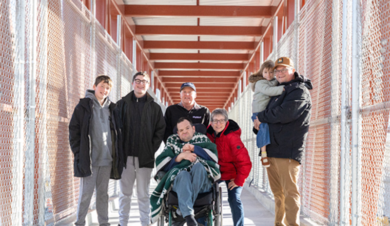 South Jordan Man in Wheelchair Celebrates as First to Cross UDOT's New Pedestrian Bridge