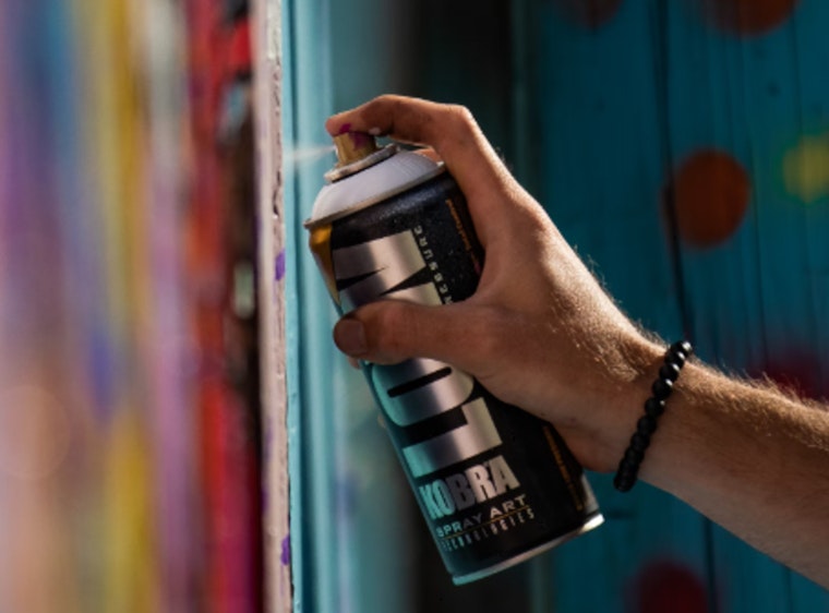 Austin Unites to Restore Defaced 'We Can't Breathe' Mural, Local Artist and Community Stand Against Racial Injustice