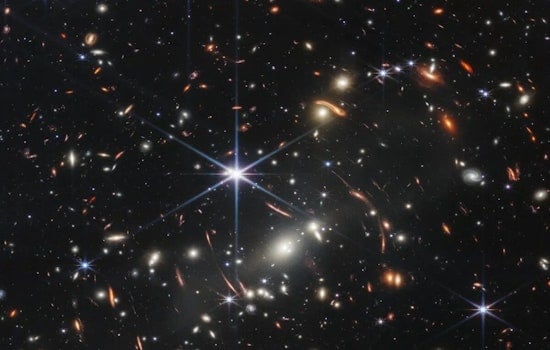 "Cosmic Curveball, James Webb Spies Ultramassive Early Galaxies, Baffling Austin Astronomers"