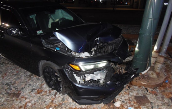 Driver Flees After Crashing Car onto MBTA Tracks in Boston, Causing Commuter Delays