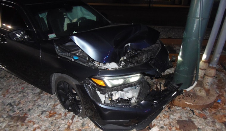 Driver Flees After Crashing Car onto MBTA Tracks in Boston, Causing Commuter Delays