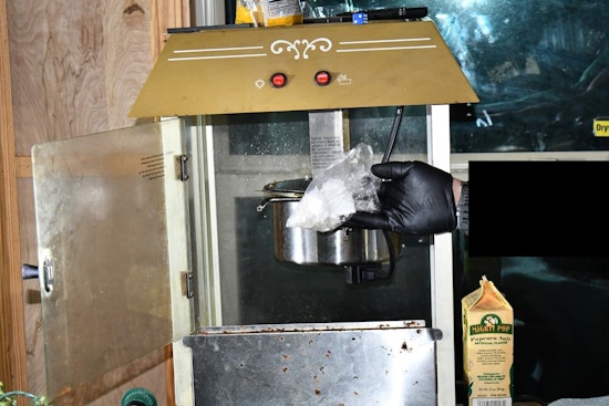 Henry and DeKalb County Police Uncover Drugs in Popcorn Maker, Seize Guns in Coordinated Raids