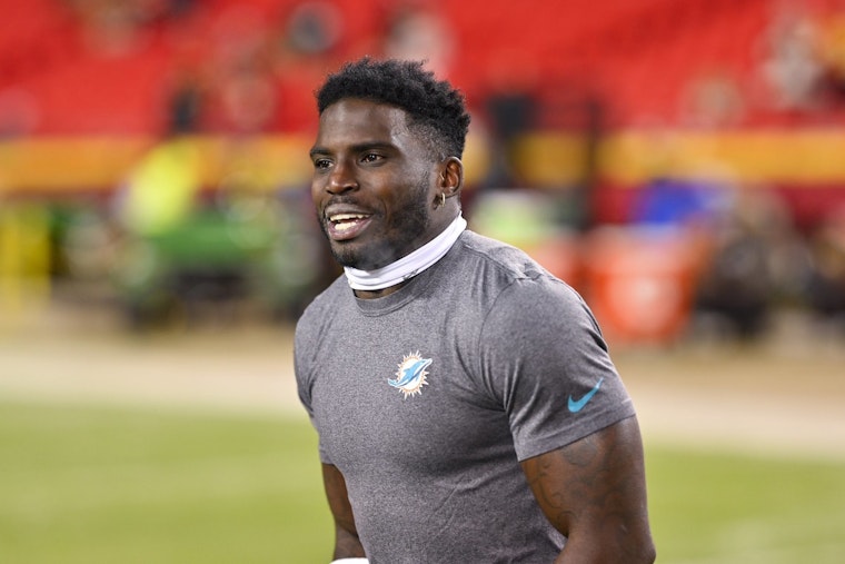 Miami Dolphin's Tyreek Hill Withdraws Divorce Filing, Signals Reconciliation with Wife Keeta Vaccaro