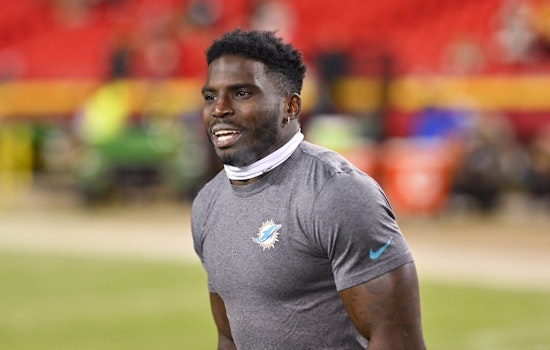 Miami Dolphin's Tyreek Hill Withdraws Divorce Filing, Signals Reconciliation with Wife Keeta Vaccaro