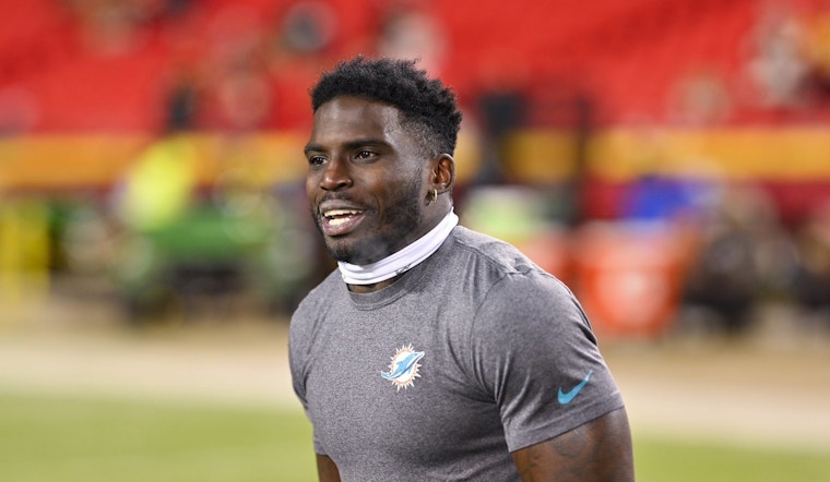 Miami Dolphin's Tyreek Hill Withdraws Divorce Filing, Signals Reconciliation with Wife Keeta Vaccaro