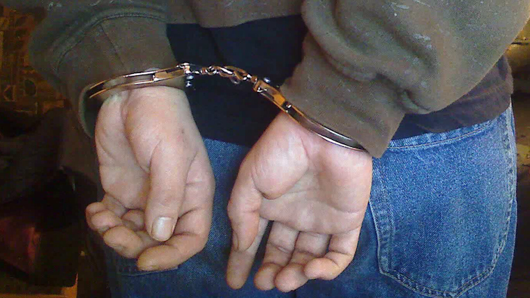 Michigan Standoff Ends with Arrest of Man Suspected of Threatening Family, Police with Bow