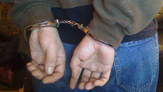Michigan Standoff Ends with Arrest of Man Suspected of Threatening Family, Police with Bow