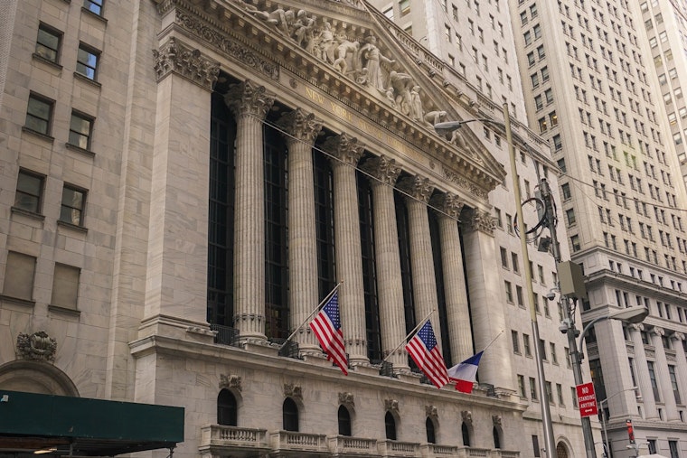 Wall Street Dips as Inflation Surprises, Prompting Recalibration of Fed Rate Cut Expectations