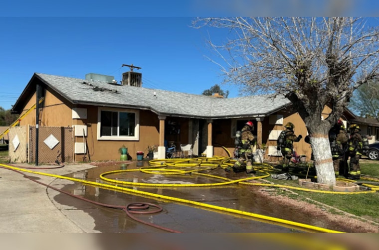West Phoenix Home Engulfed in Flames Displaces Nine, No Injuries Reported
