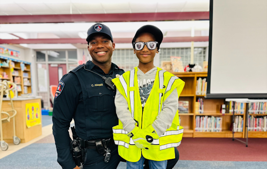 Arlington Police Officer Engages with Young Minds at Ellis Elementary's Career Day