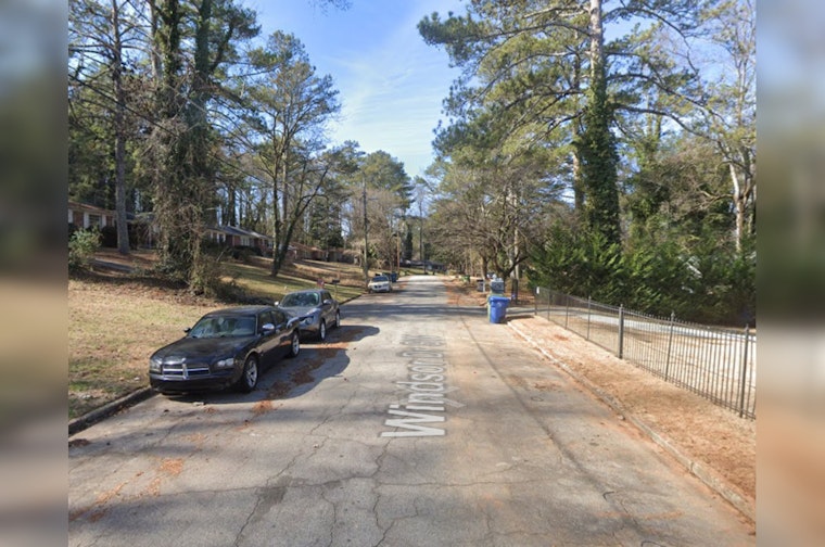 Atlanta Neighbor Alerts Firefighters, Leading to Rescue of Woman and Dog from House Fire
