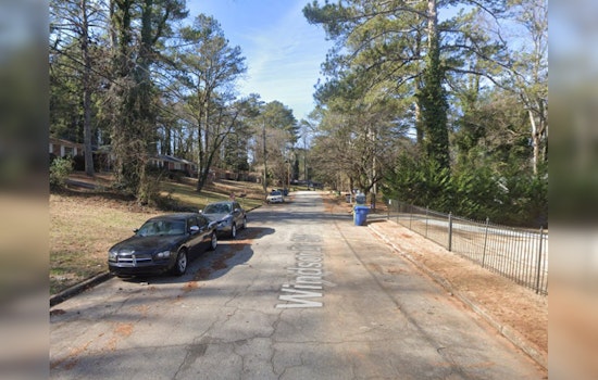 Atlanta Neighbor Alerts Firefighters, Leading to Rescue of Woman and Dog from House Fire