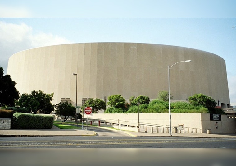 Austin's Frank Erwin Center Bows Out to Progress Amid Careful Demolition for Future Medical Facility