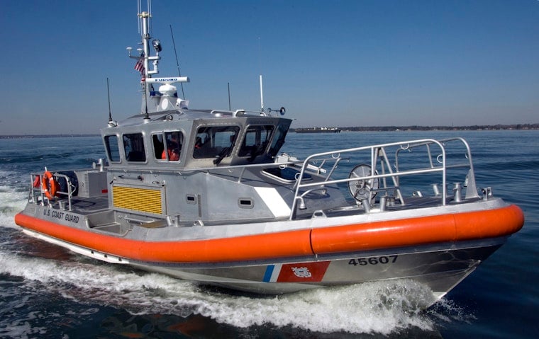 Coast Guard and Washington State Ferry Crew Heroically Rescue Six People and Two Dogs from Sinking Boat in Rosario Strait