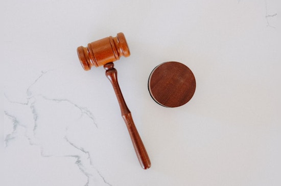 Detroit Woman Charged with Posing as CPA and Real Estate Agent Without Licenses