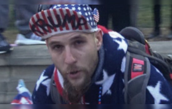 Illinois Man Charged with Assaulting Officers Using 'Trump' Flag During Capitol Riot