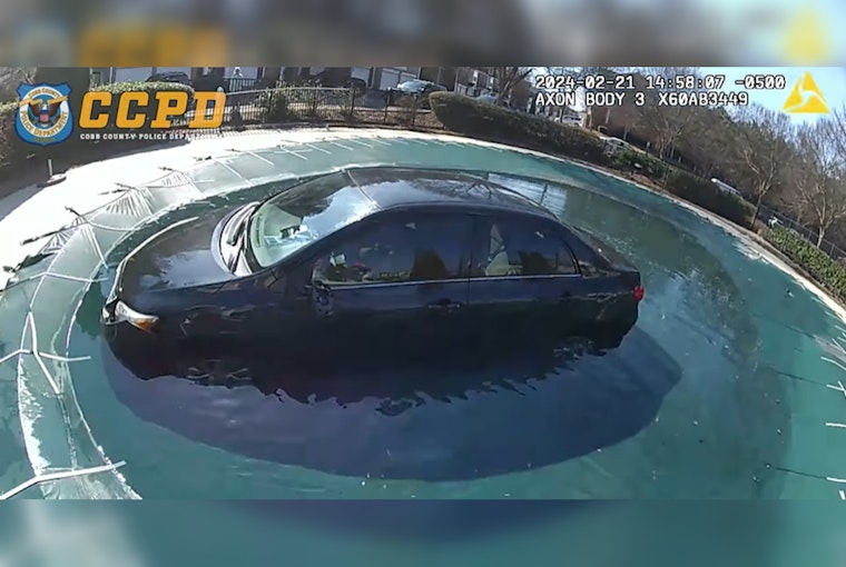 Kennesaw Police Rescue Unconscious Driver from Car in Condo Complex Pool
