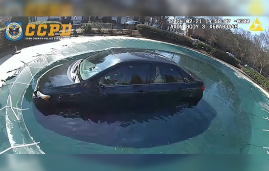 Kennesaw Police Rescue Unconscious Driver from Car in Condo Complex Pool