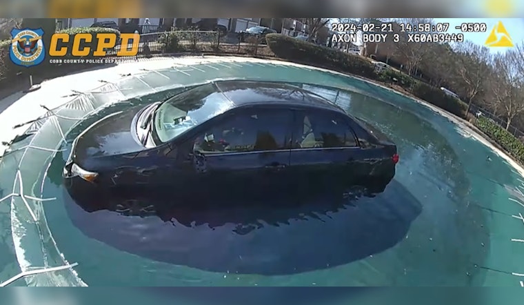 Kennesaw Police Rescue Unconscious Driver from Car in Condo Complex Pool