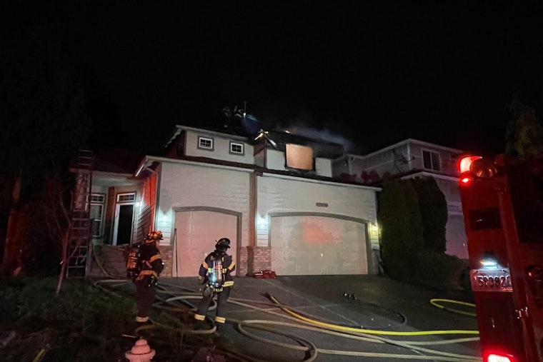Kent Resident Rescued from Rooftop by Firefighters During Midnight House Fire