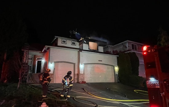 Kent Resident Rescued from Rooftop by Firefighters During Midnight House Fire