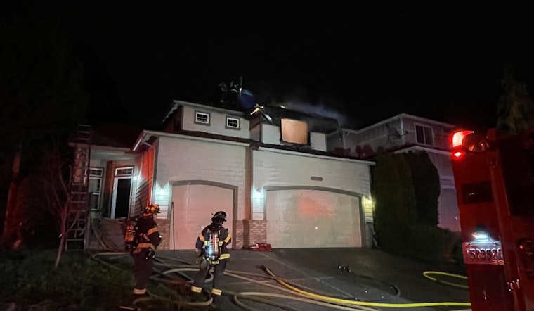 Kent Resident Rescued from Rooftop by Firefighters During Midnight House Fire