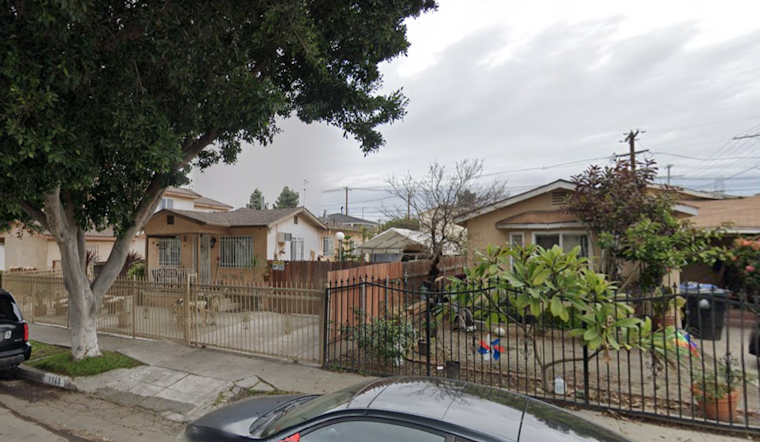 Los Angeles Firefighters Extinguish RV Fire in Green Meadows, Save Adjacent Building