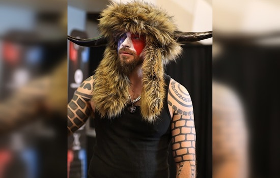 "QAnon Shaman" Eyes Arizona's Congressional Seat After Capitol Riot Sentence