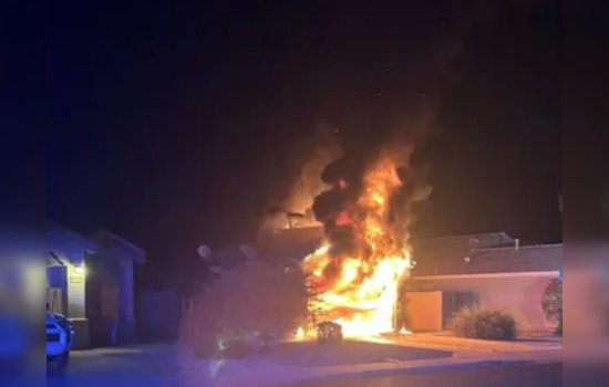 Surprise Home Engulfed in Flames, Firefighters Deploy Cutting-edge Tactic on Hybrid Vehicle Fire