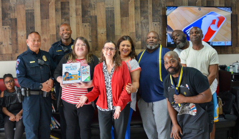 Arlington Cops and Public Library Launch 'Shop Talk' Initiative to Boost Child Literacy in Barbershops