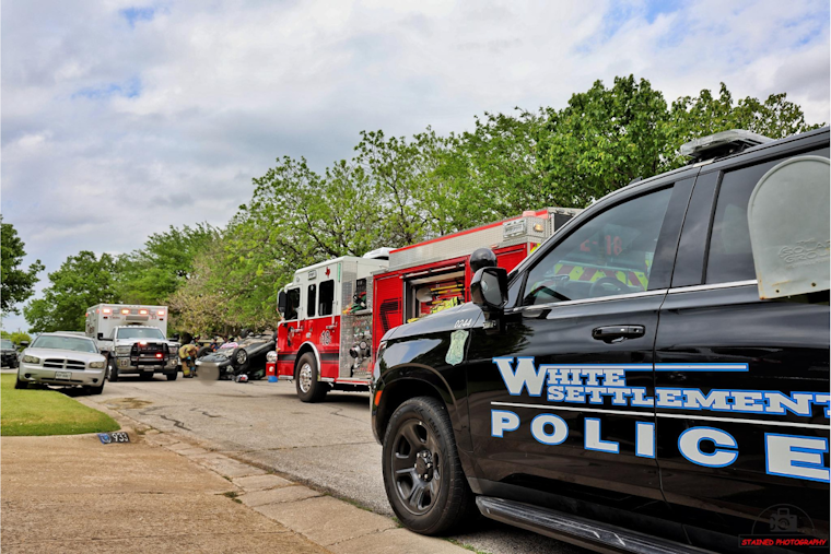 Driver Escapes Injury in White Settlement after Vehicle Strikes Parked Car, Rolls Over