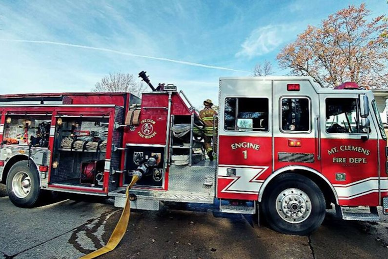 Heroic Sanitation Workers Rescue Elderly Woman from Mount Clemens House Fire