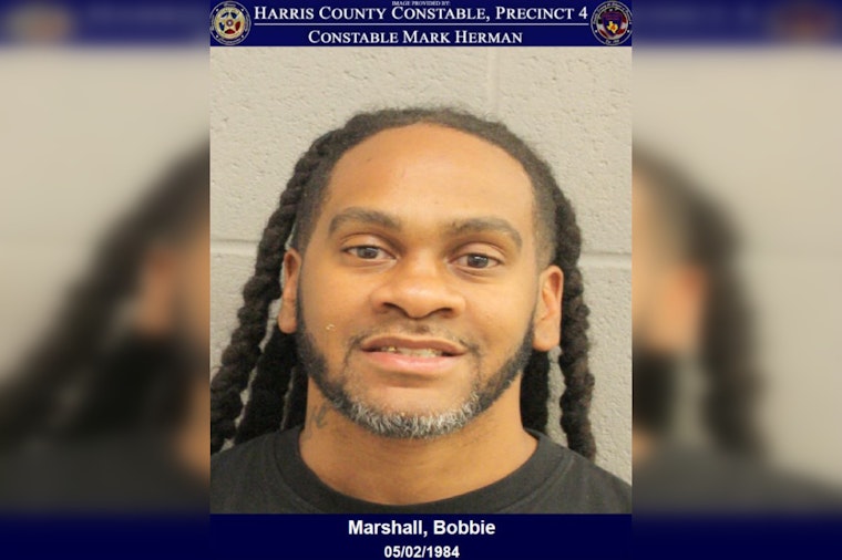 Houston Man Charged with DWI After Found Unconscious at Wheel on Parkway