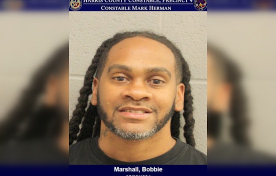 Houston Man Charged with DWI After Found Unconscious at Wheel on Parkway