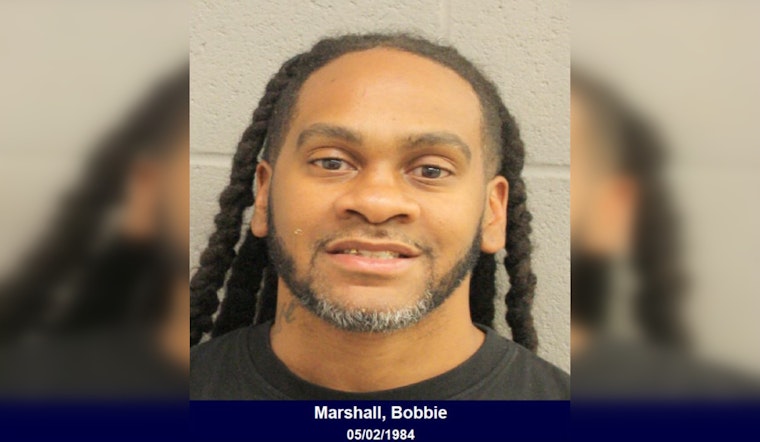Houston Man Charged with DWI After Found Unconscious at Wheel on Parkway