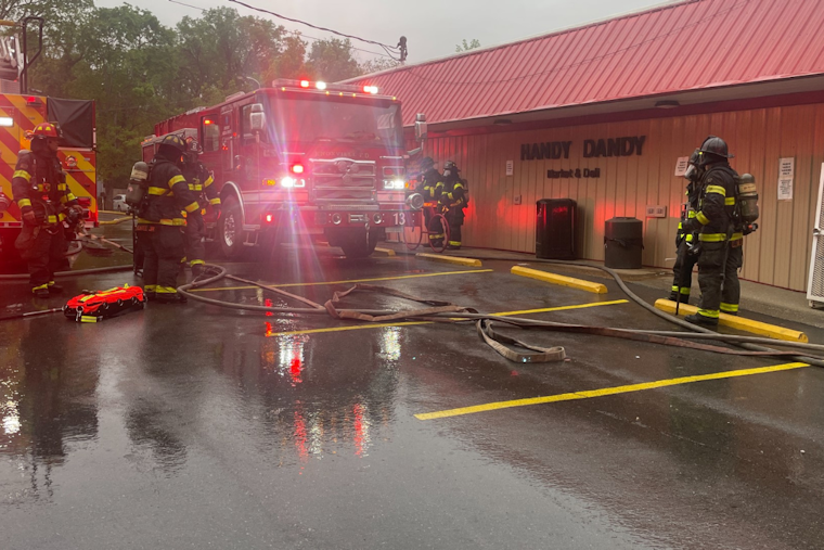 Knoxville Fire Department Quells Cooler Fire at Handy Dandy Market, Averts Tragedy