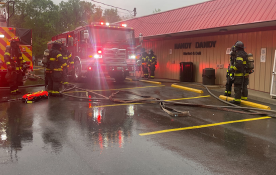 Knoxville Fire Department Quells Cooler Fire at Handy Dandy Market, Averts Tragedy