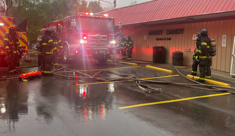 Knoxville Fire Department Quells Cooler Fire at Handy Dandy Market, Averts Tragedy