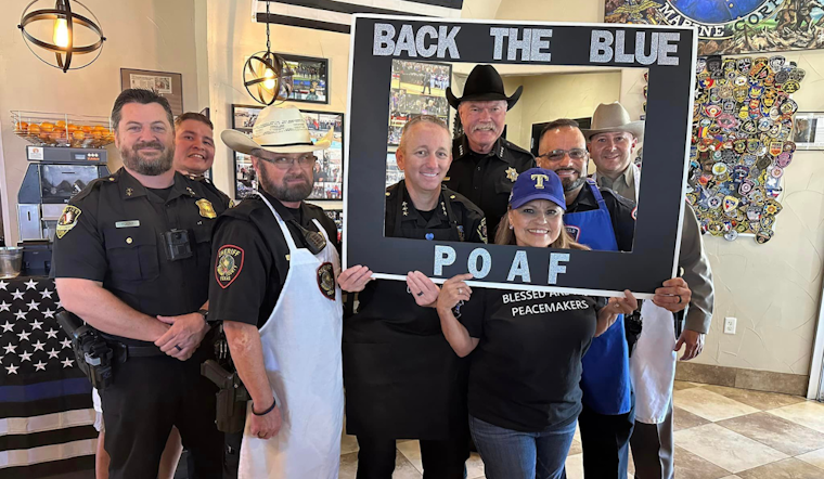 Local Law Enforcement Swaps Handcuffs for Aprons at "Dining for Heroes" Event to Support Fallen Officers' Foundation