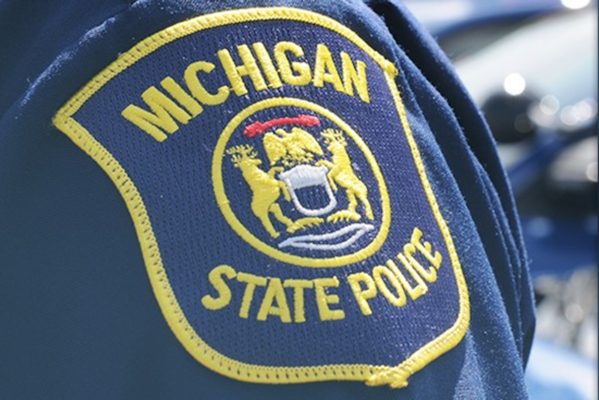Michigan State Trooper Sustains Minor Injuries in Collision with Tesla SUV in Monroe County