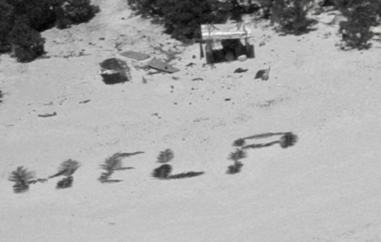 Stranded Sailors Spell "HELP" with Palm Leaves, Prompting Rescue from Pikelot Atoll by U.S. Coast Guard