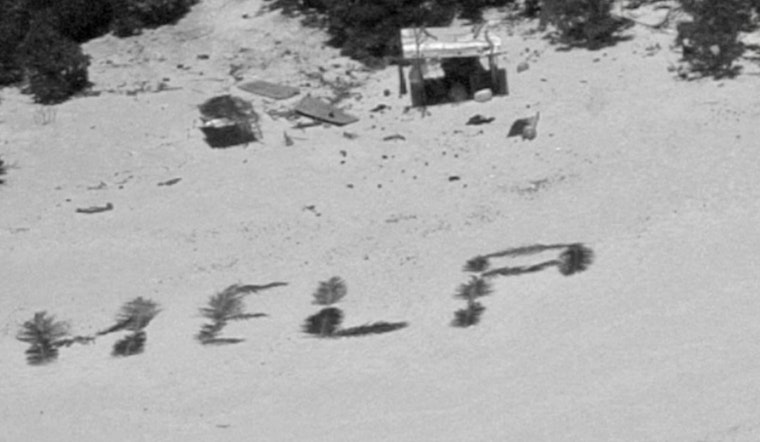 Stranded Sailors Spell "HELP" with Palm Leaves, Prompting Rescue from Pikelot Atoll by U.S. Coast Guard