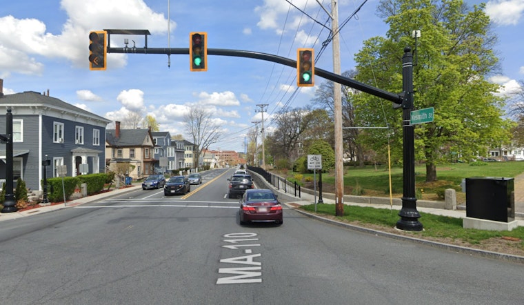 Three Injured as School Bus Tips Over in Lowell Collision, No Children Onboard