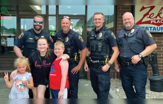 Bloomington Police Swap Handcuffs for Scoops in Community-Building 'Cops and Cones' Summer Event