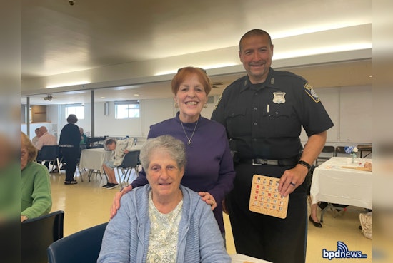 Boston Police Officers Serve Smiles and Lunch to Seniors at St. John Parish Community Event