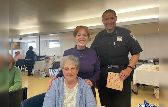 Boston Police Officers Serve Smiles and Lunch to Seniors at St. John Parish Community Event