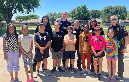 Carrollton Police Officers Bond with Youth at Local Field Day Event