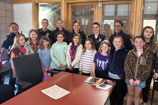 Girl Scouts Partner with South Boston Police to Beautify Neighborhood and Strengthen Community Bonds